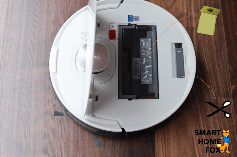 You can find the cleaning tool of ecovac’s robot vacuums under the lid.